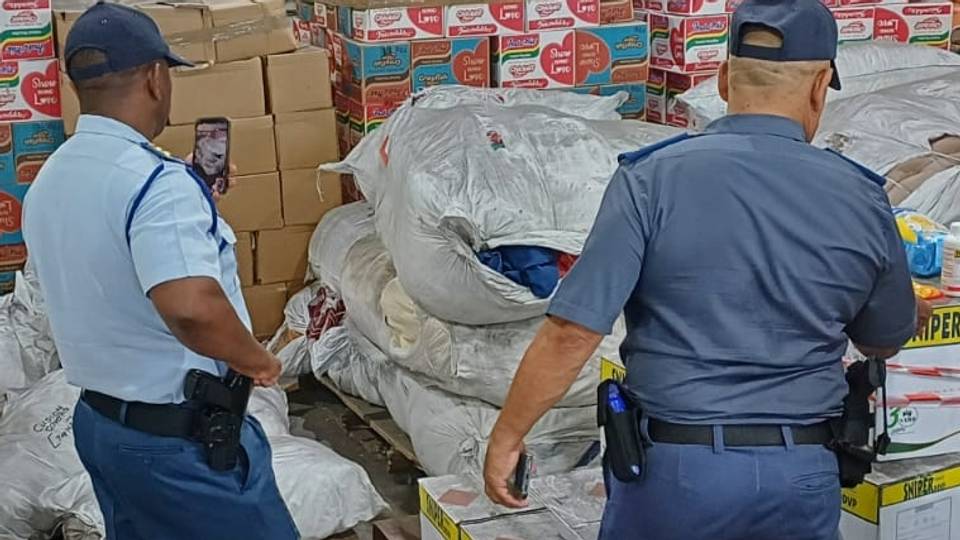 Food poisoning: South Africa's police raid warehouses
