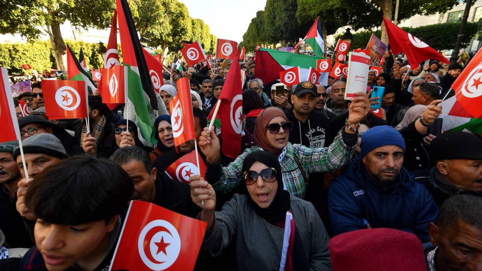 Hundreds of Tunisians protest on revolution anniversary