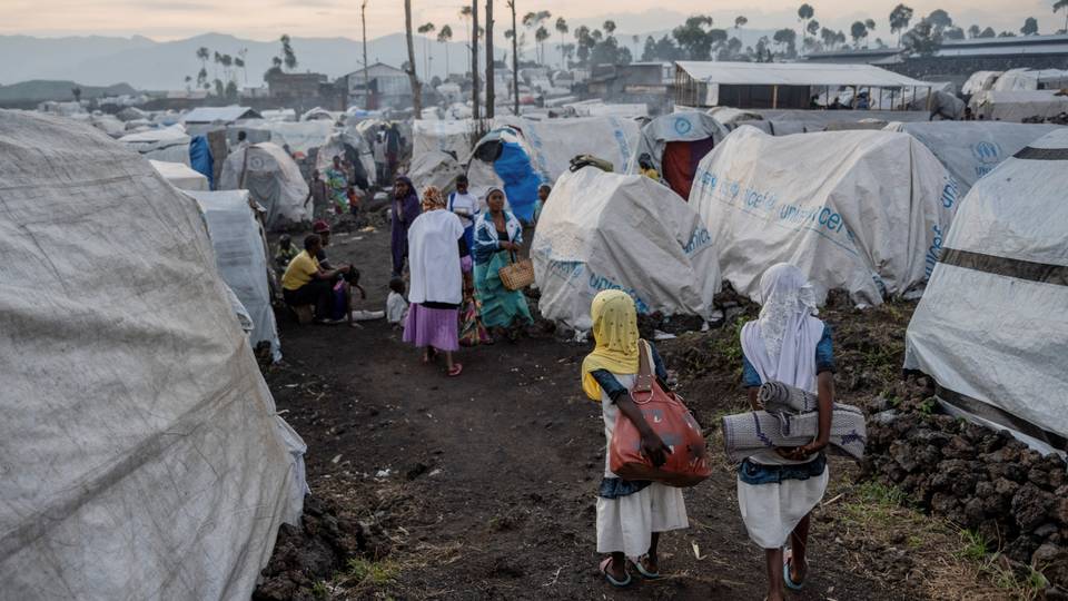 Rwanda and rebels blamed for deadly camp strikes in DR Congo