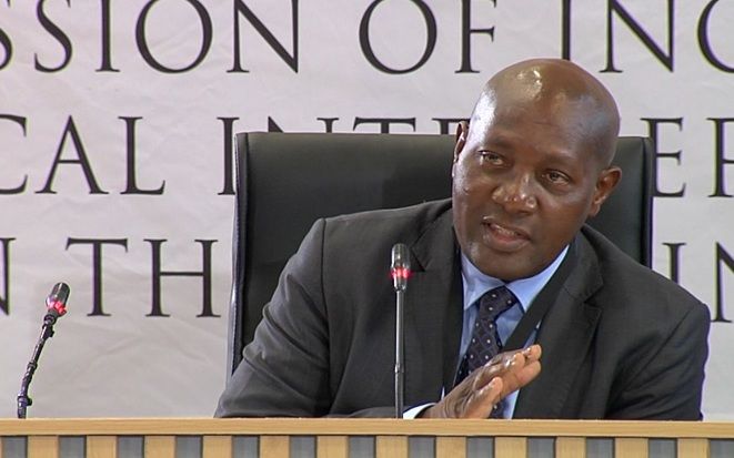 South Africa sacks organised crime unit boss after links to 'known criminal'