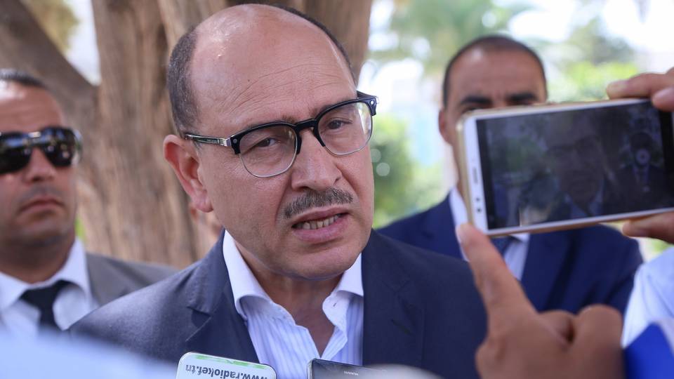 Tunisian court jails opposition leader, bans him from ever vying
