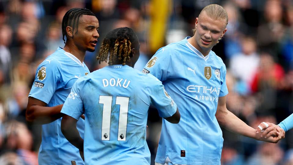 Man City go top of Premier League as Spurs smashed