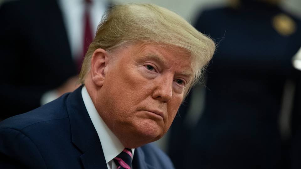 Trump taken into the dock for landmark criminal trial