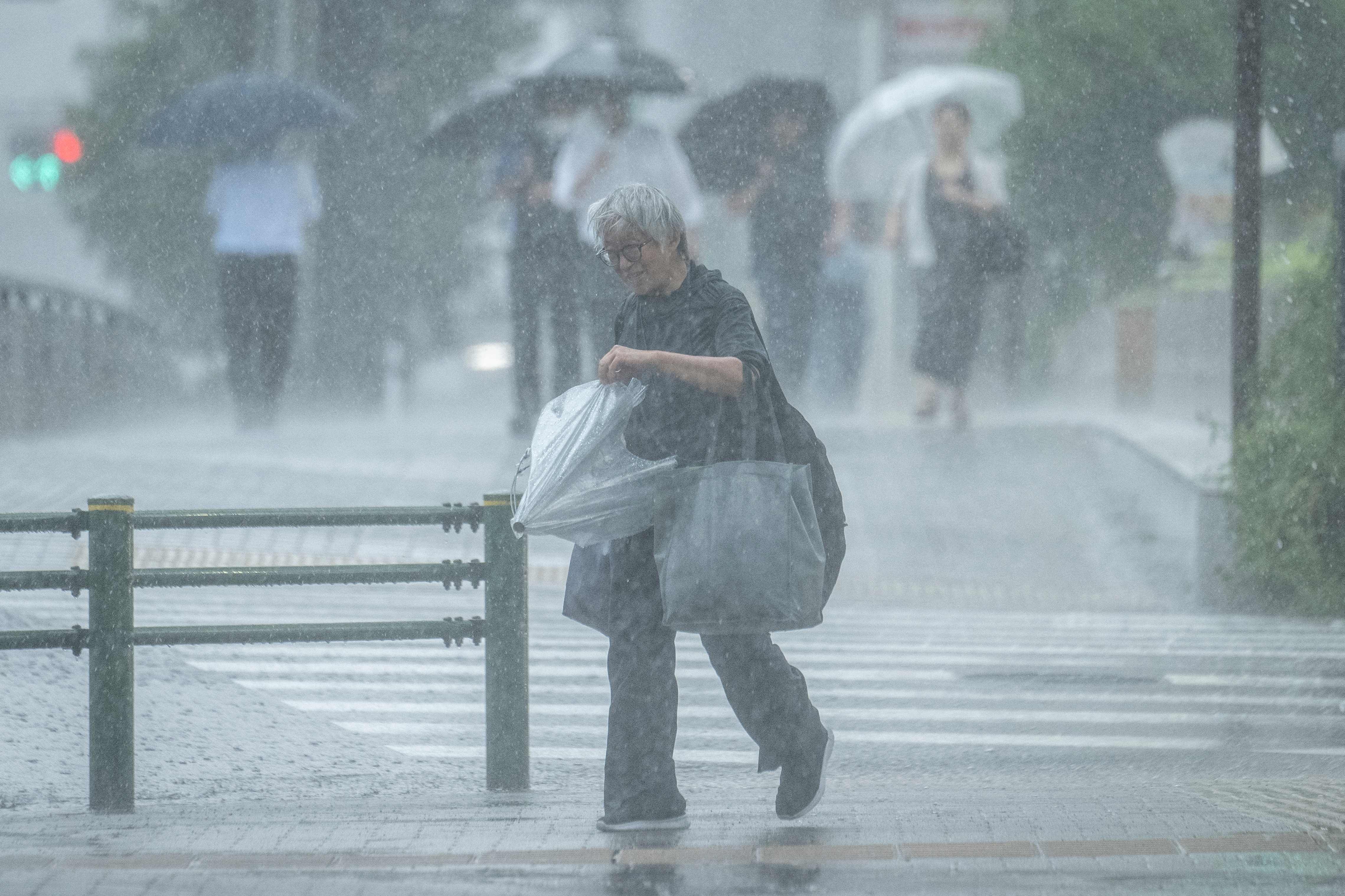 Central Tokyo lashed with record 34 straight days of rain