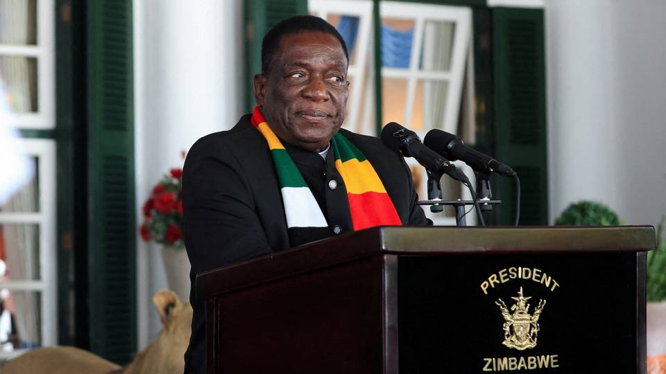 Zimbabwe's president hands over power for vacation