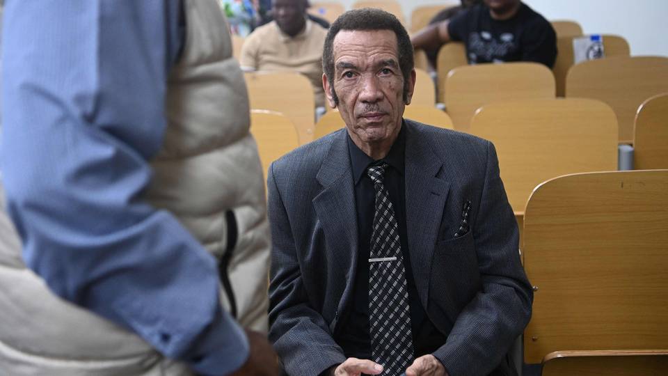 Exiled Botswana ex-President Khama returns home to face charges