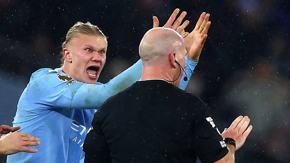 Man City charged by FA over players' anger at referee