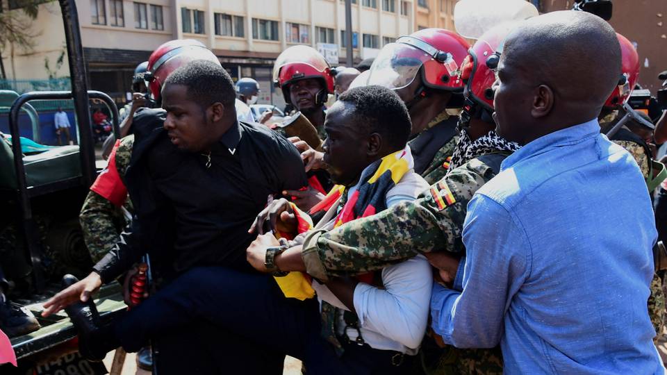 Uganda police arrest dozens of protesters