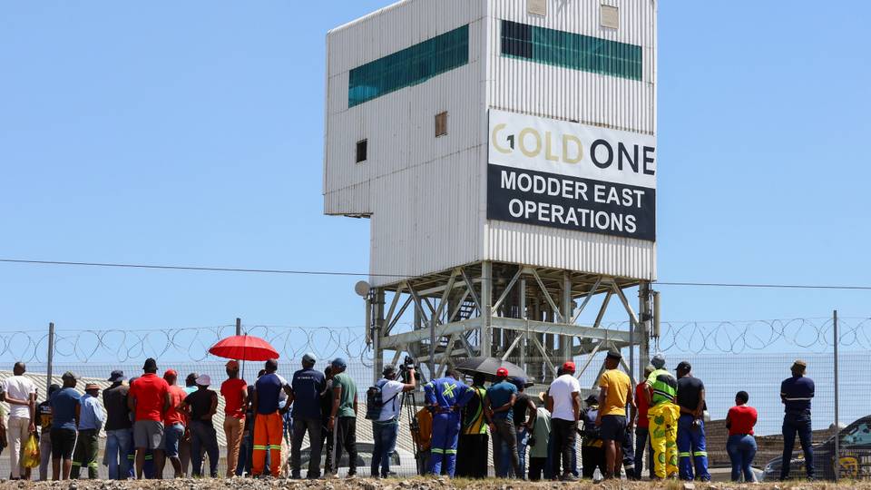 South African miners resurface after underground row