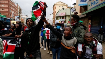 Kenya's new cabinet sworn in as protests resume