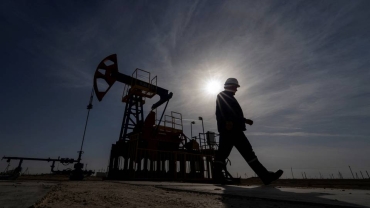 Crude prices drop after Angola quits OPEC