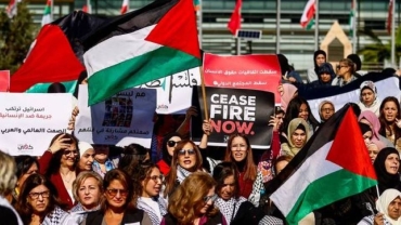 In Pictures: Thousands mark International Day of Solidarity with Palestine
