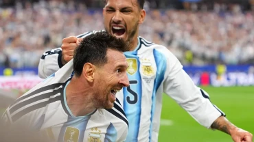 Messi sets World Cup scoring record as defending champions Argentina advance to knockout stage