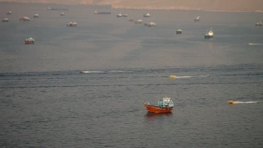 Iran says oil tanker catches fire after hitting mine in Strait of Hormuz