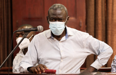Ugandan opposition figure Besigye refuses court-appointed lawyers at treason trial