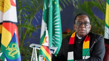Zimbabwe's Mnangagwa signs law extending his term, changing how president is elected