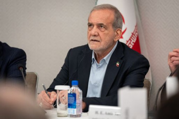 Iran leader vows no surrender, apologises to neighbouring states