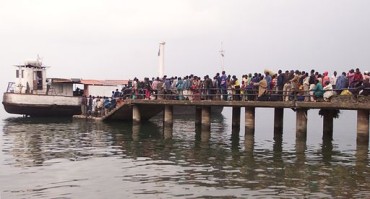 Rescuers search for 70 missing after boat capsizes in DR Congo