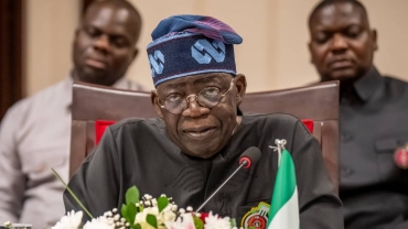 Nigeria's Tinubu says tax reform plan 'here to stay' amid pushback