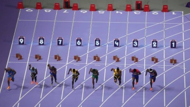 'Pitch invasion attempt delayed men's Olympic 100m final'