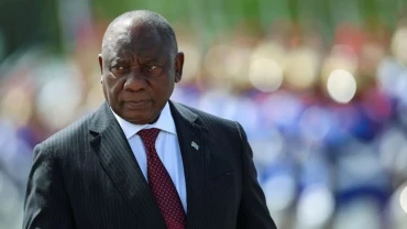 South Africa's president sacks minister facing corruption allegations