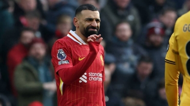 Liverpool edge past Wolves to go seven points clear at top