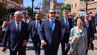 Turkish FM visits China's Uyghur-populated Xinjiang region