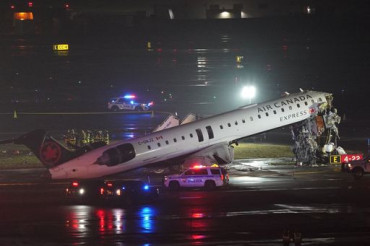 Pilot, co-pilot killed in LaGuardia runway collision: US media