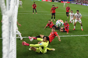 Egypt secure place in World Cup knockouts after 1-1 draw with Iran
