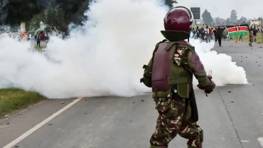 Kenya police use teargas to disperse anti-France protesters near summit co-hosted by Macron