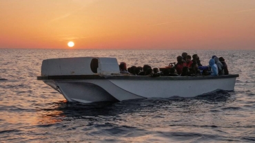 Woman gives birth on migrant boat