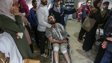 Live Updates: Israel releases 114 Palestinians, many with 'bone fractures'