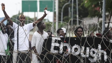 Nigeria orders arrest of British citizen linked to protests