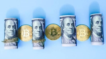Bitcoin soars above $57,000 as dollar slides