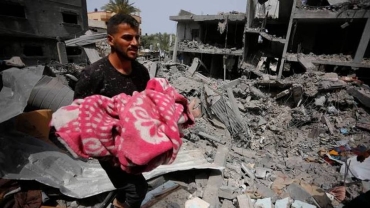 Live Updates: Overnight air strike kills dozens in central Gaza