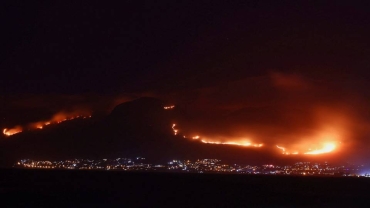Firefighters battle wildfire on mountain near Cape Town