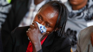 Kenya school fire: Thousands attend mass funeral for victims
