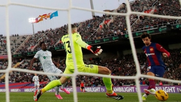 Barcelona thrash Getafe to climb to second in La Liga