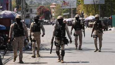 Police battle gangs trying to seize control of Haiti capital