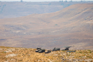 Israeli forces raid homes, establish checkpoint in southern Syria
